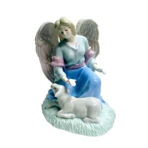 Angel with Animal Porcelain Musical Sculpture